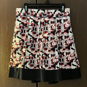 Ann Taylor red, black and white circular designed skirt. Size 6.